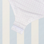 Girls one piece swimsuit in pink gingham with heart snap domes