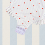 Girls one piece long sleeve swimsuit lilac stripe with red hearts UP50+ with double frills on legs