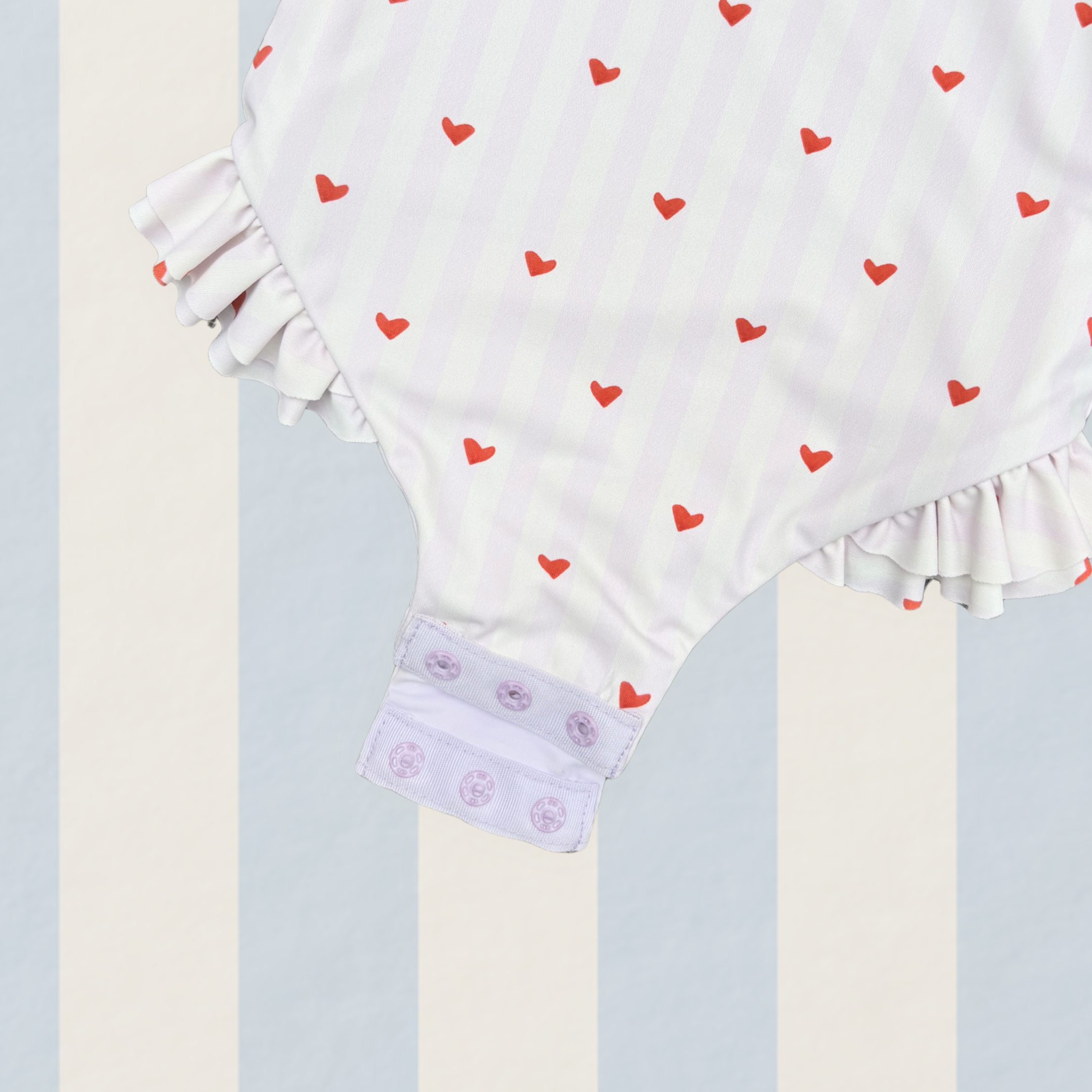 Girls one piece long sleeve swimsuit lilac stripe with red hearts UP50+ with double frills on legs