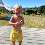 Boys swim shorts hand-painted chillis yellow red UPF50+ soft lined