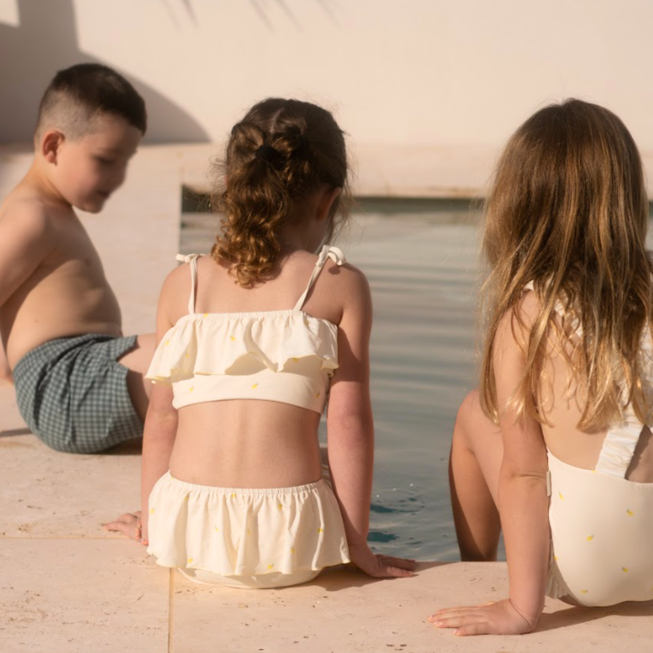 Girls bikini swimsuit hand-painted watercolour lemon pattern UP50+ frilly yellow and cream